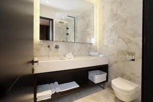 Koupelna v ubytování Maccani Black Luxury Suites