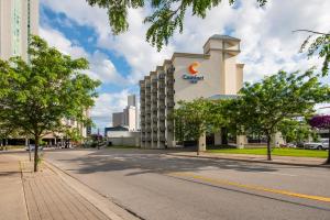 a building with a cazon sign on it on a street at Comfort Inn Fallsview in Niagara Falls