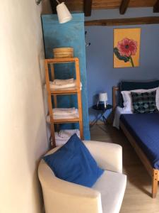 En eller flere senge i et værelse på Casa D'arte2