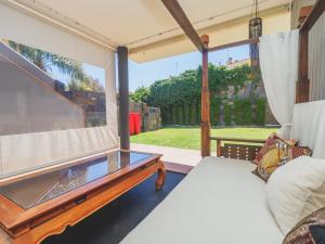 Televízia a/alebo spoločenská miestnosť v ubytovaní Cubo's Gibralfaro House Center