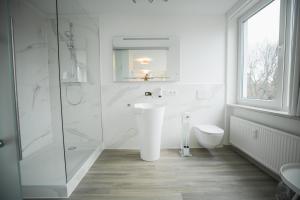 Ein Badezimmer in der Unterkunft Hotel in Herrenhausen