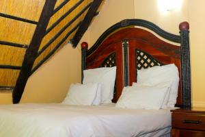 Cama ou camas em um quarto em Mapelepele Cottage