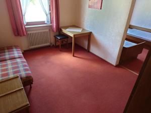 Postel nebo postele na pokoji v ubytování Gästehaus Loehnert GmbH