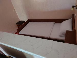 Postel nebo postele na pokoji v ubytování Gästehaus Loehnert GmbH