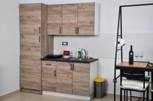 A kitchen or kitchenette at Guest House Atena