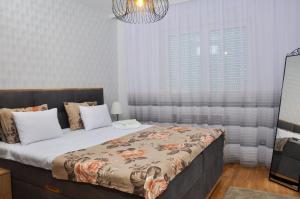 Postel nebo postele na pokoji v ubytování Guest House Atena