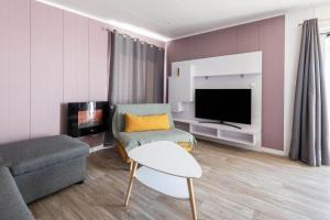 Posedenie v ubytovaní Chalet pour 6 dans une résidence avec piscine