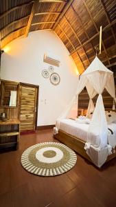 Postel nebo postele na pokoji v ubytování Griyatama Bungalow