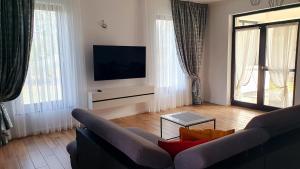 TV a/nebo společenská místnost v ubytování CasaNova