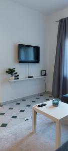 Televízia a/alebo spoločenská miestnosť v ubytovaní Apartman Marin - Zadar