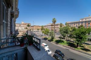 a view of a city street with cars parked on a balcony at il passetto in Rome