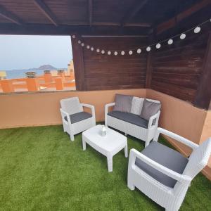 Część wypoczynkowa w obiekcie Casa M de mar - Dúplex con vistas