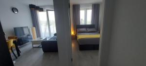 Posteľ alebo postele v izbe v ubytovaní Apartament BARCELONA