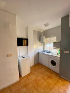 Kuchyň nebo kuchyňský kout v ubytování Apartamento cerca de la playa