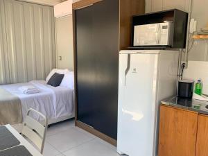 Una cocina o kitchenette en Charmoso Studio Moema