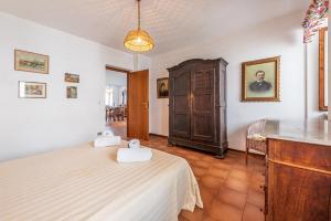 A bed or beds in a room at La Casa Di Laura