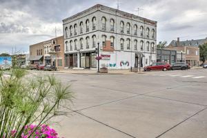an old building on the corner of a city street at Modern Yankton Apartment Near Riverside Park! in Yankton