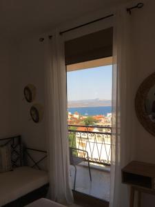 Fotografie z fotogalerie ubytování ANASTASIA LUXURY SUITES 2 v destinaci Tolo + 22 fotografií