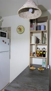 A kitchen or kitchenette at Studio Marina pointe du bout vue sur le port