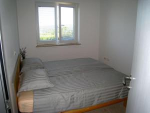 Postel nebo postele na pokoji v ubytování Apartments in the countryside of Koper