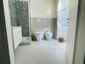 Koupelna v ubytování B&B S'arciaredda