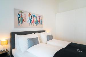 Postel nebo postele na pokoji v ubytování Vienna Residence, Marina Tower - Danube