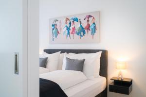 Postel nebo postele na pokoji v ubytování Vienna Residence, Marina Tower - Danube