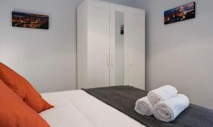 Posteľ alebo postele v izbe v ubytovaní MALAGUETA BEACH HOUSE