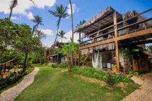 a view of the house from the garden at Bangalô Kauli Seadi Eco-Resort in São Miguel do Gostoso