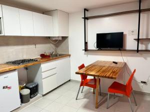 Una cocina o kitchenette en la Ruca 4