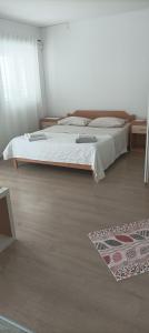 En eller flere senge i et værelse på Feel good apartment