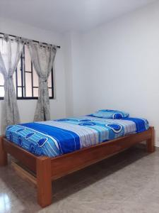 Ένα ή περισσότερα κρεβάτια σε δωμάτιο στο Casa hotel hispania 1