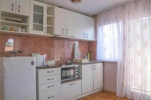 Η κουζίνα ή μικρή κουζίνα στο Garden Apartment