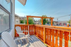a deck with two chairs and a pergola at Mount Hood Vista in Parkdale