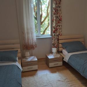 Posteľ alebo postele v izbe v ubytovaní Apartman Fiume