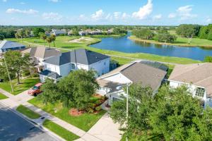 an aerial view of a house and a river at Remington View Retreat in Kissimmee