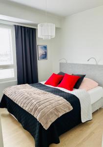 Postel nebo postele na pokoji v ubytování Bellarova Apartments II