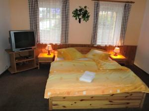 Postel nebo postele na pokoji v ubytování Pension Hela