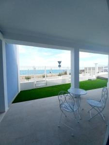 A balcony or terrace at Dolce Dimora Charme Mare