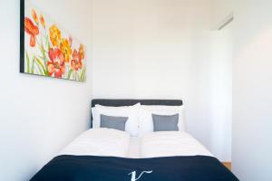 Postel nebo postele na pokoji v ubytování Vienna Residence, Marina Tower - Danube