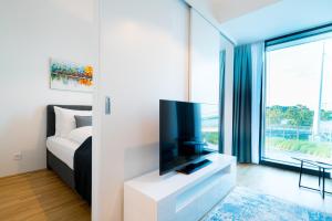 TV a/nebo společenská místnost v ubytování Vienna Residence, Marina Tower - Danube
