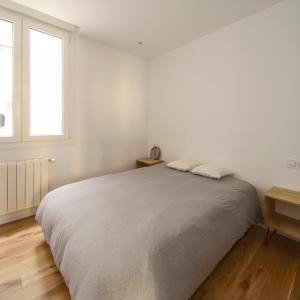 Łóżko lub łóżka w pokoju w obiekcie City Centre San Mamés