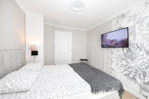 Posteľ alebo postele v izbe v ubytovaní Golden Mountain + 2 fotografie