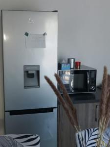 Kuchyňa alebo kuchynka v ubytovaní Maison neuve contemporaine parking