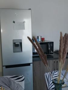 Kuchyňa alebo kuchynka v ubytovaní Maison neuve contemporaine parking