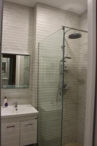 Vannituba majutusasutuses Travel to New Gudauri Loft 1 Apartment 117