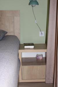 Voodi või voodid majutusasutuse Travel to New Gudauri Loft 1 Apartment 117 toas