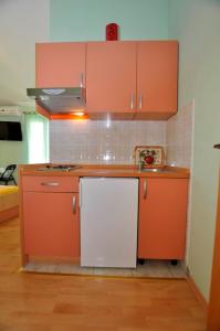Kuchyň nebo kuchyňský kout v ubytování Studio Makarska 14091a