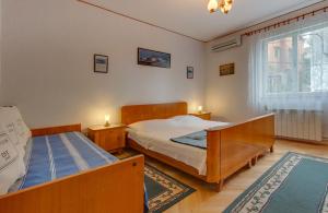 Postel nebo postele na pokoji v ubytování Apartments by the sea Mali Losinj (Losinj) - 14166
