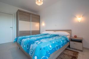Postel nebo postele na pokoji v ubytování Apartment Verunic 14286d